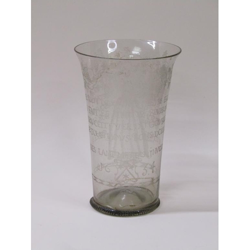 166 - A mid 17c ecclesiastical glass beaker with milled base, a/f, museum type repair to base, 20cm h - Th... 