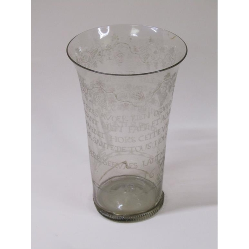 166 - A mid 17c ecclesiastical glass beaker with milled base, a/f, museum type repair to base, 20cm h - Th... 