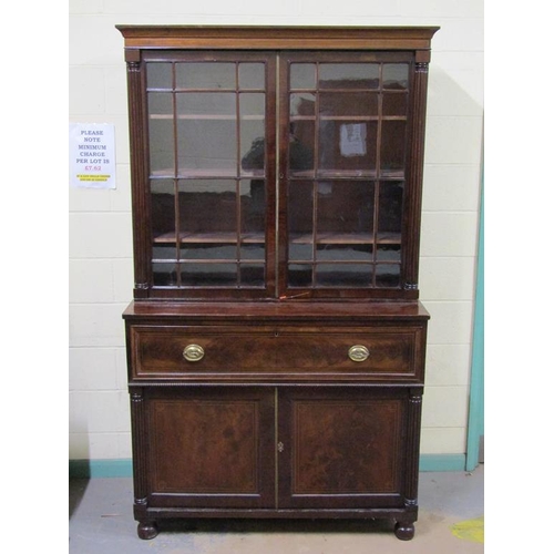 266 - A late Georgian figure mahogany secretaire bookcase, the upper section fitted shelves and enclosed b... 