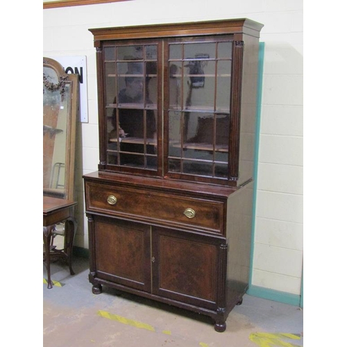 266 - A late Georgian figure mahogany secretaire bookcase, the upper section fitted shelves and enclosed b... 