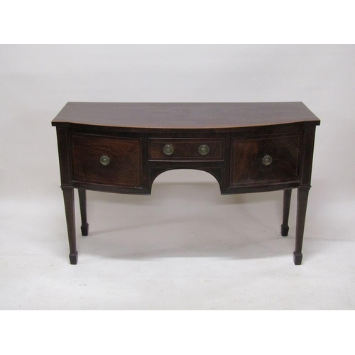 267 - An early 19c mahogany slight bow front sideboard fitted one central drawer over kneehole flanked by ... 