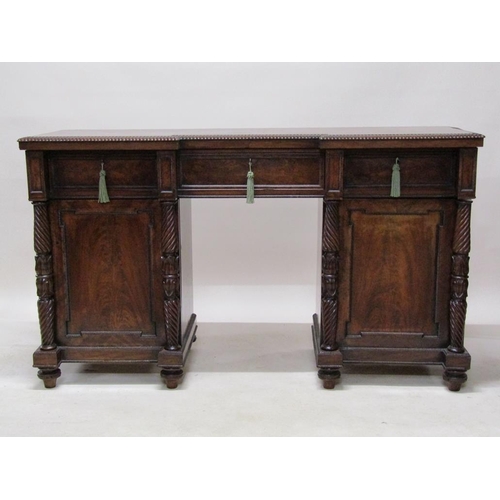 268 - A William IV mahogany pedestal sideboard, the slight breakfront top with gadrooned carved edge over ... 