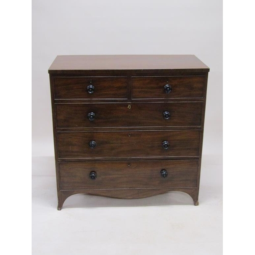 270 - An early 19c figured mahogany chest of two short and three long graduated drawers on bracket feet, 1... 