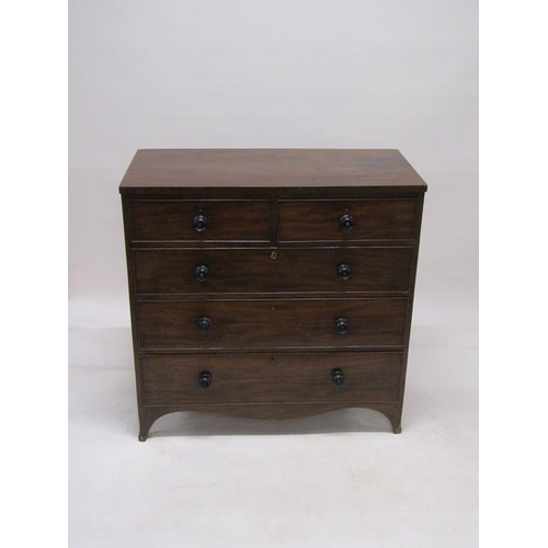 270 - An early 19c figured mahogany chest of two short and three long graduated drawers on bracket feet, 1... 