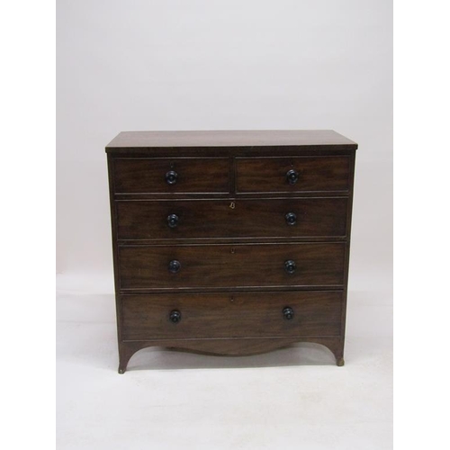 270 - An early 19c figured mahogany chest of two short and three long graduated drawers on bracket feet, 1... 