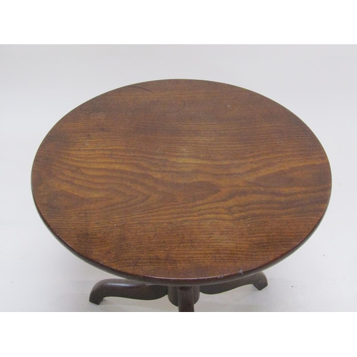 271 - A late Georgian mahogany circular pedestal tripod table, 61cm diam, 59cm h.