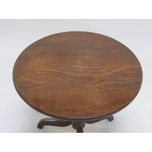 271 - A late Georgian mahogany circular pedestal tripod table, 61cm diam, 59cm h.