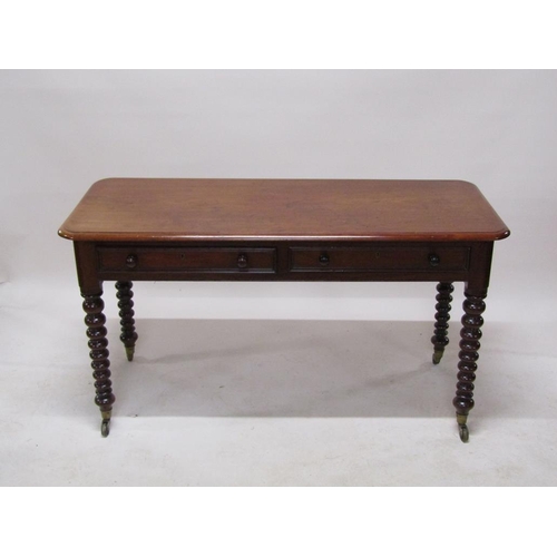 272 - A Victorian mahogany side table of rectangular form with moulded edge and rounded corners, having tw... 