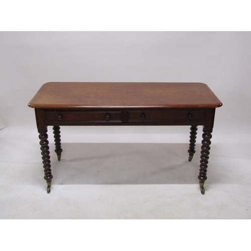 272 - A Victorian mahogany side table of rectangular form with moulded edge and rounded corners, having tw... 