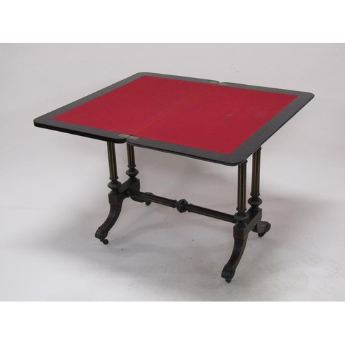 274 - A late Victorian ebonised and burr wood fold over card table of refectory form with beaded brass rai... 