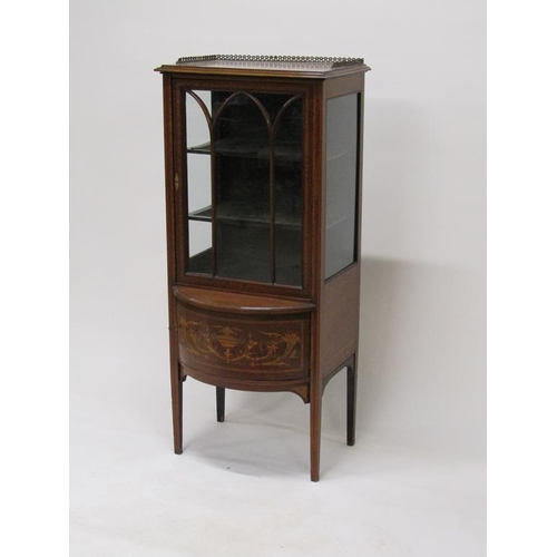 276 - A late 19c/early 20c mahogany side cabinet fitted shelves and enclosed by arched astragal glazed doo... 