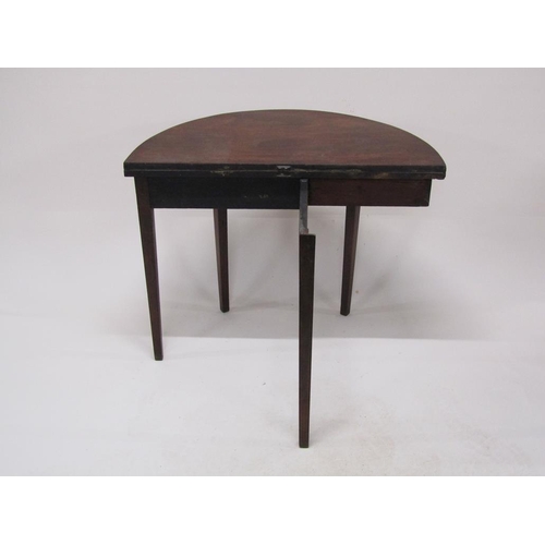 277 - A Regency mahogany demi lune fold over tea table with a deep frieze, satinwood line inlay and suppor... 