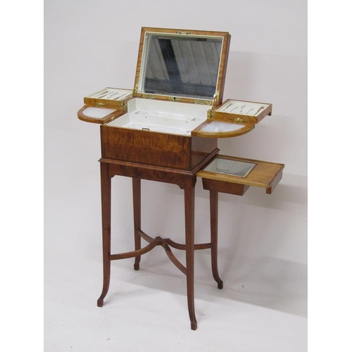 283 - An early 20c Asprey satinwood ladies dressing box, fitted but no tools, with rising mirrored cover a... 