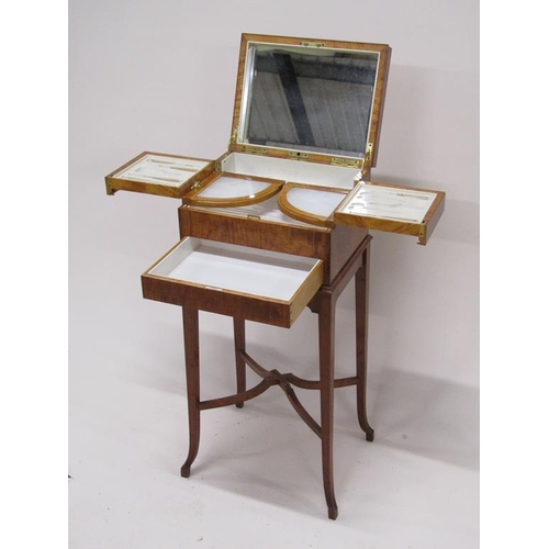 283 - An early 20c Asprey satinwood ladies dressing box, fitted but no tools, with rising mirrored cover a... 