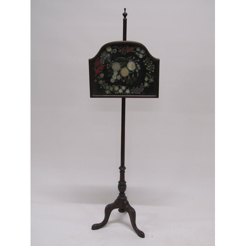 284 - A late Georgian mahogany pole screen with a Berlin type floral panel, 156cm h.