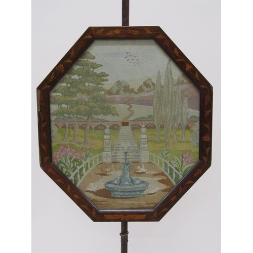 285 - An early 19c Dutch influenced marquetry decorated pole screen, the octagonal screen with a needlewor... 