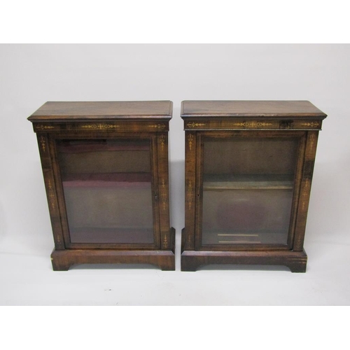 290 - A pair of mid Victorian figured walnut, marquetry decorated, pier cabinets, fitted shelves enclosed ... 