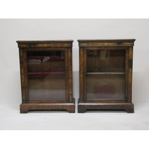 290 - A pair of mid Victorian figured walnut, marquetry decorated, pier cabinets, fitted shelves enclosed ... 