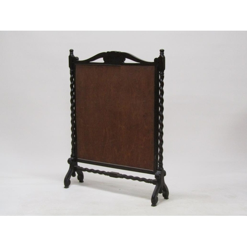 293 - A late 19c/early 20c carved oak twist carved fire screen with a needlework leaf and floral patterned... 