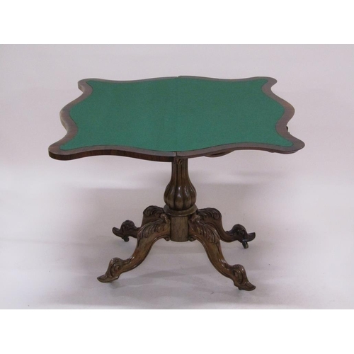 297 - A 19c rosewood pedestal fold over card table, the table top of serpentine form on a lobed baluster c... 