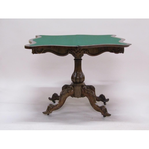 297 - A 19c rosewood pedestal fold over card table, the table top of serpentine form on a lobed baluster c... 