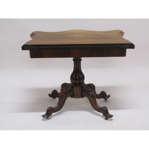 297 - A 19c rosewood pedestal fold over card table, the table top of serpentine form on a lobed baluster c... 