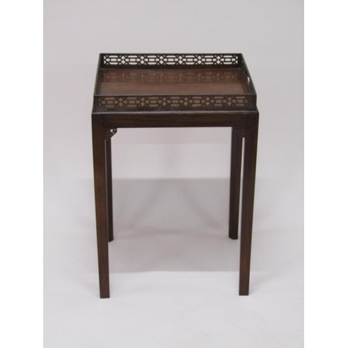 298 - A 19c figure mahogany tray top table, the tray top with a full pierced gallery on stand.