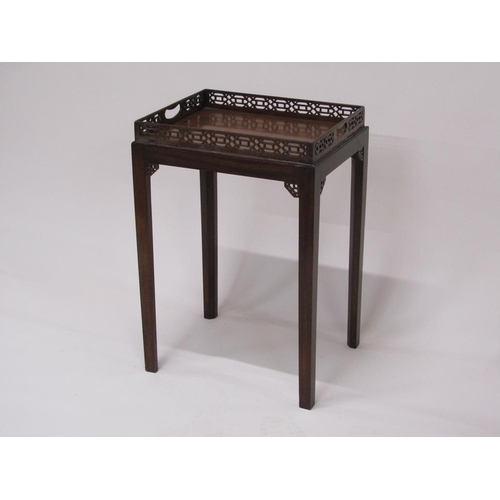 298 - A 19c figure mahogany tray top table, the tray top with a full pierced gallery on stand.