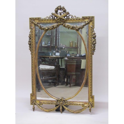 299 - A 19c gilt wood wall mirror of mid Georgian style, with oval central plate, 80cm x 131cm.