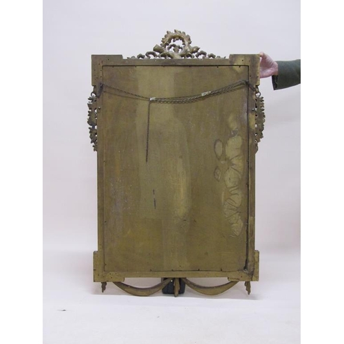 299 - A 19c gilt wood wall mirror of mid Georgian style, with oval central plate, 80cm x 131cm.