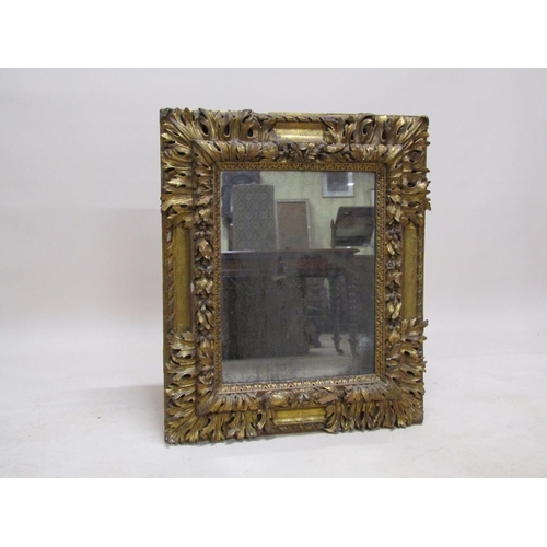 300 - A 19c, mid Georgian style, carved gilt wood and stucco wall mirror, 77cm x 93cm.