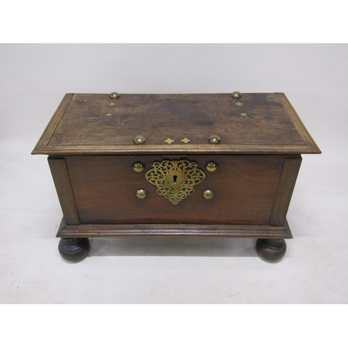 305 - A large late 18c/early 19c Dutch Colonial walnut storage box with brass fittings and random decorati... 