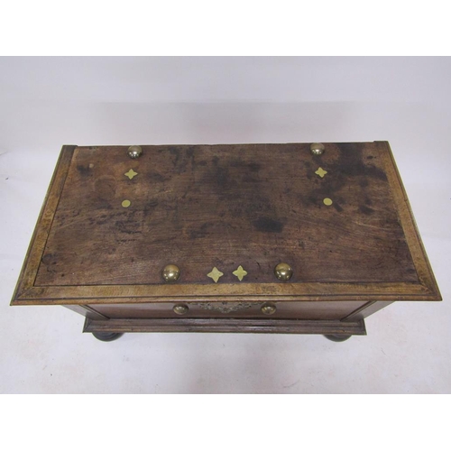 305 - A large late 18c/early 19c Dutch Colonial walnut storage box with brass fittings and random decorati... 