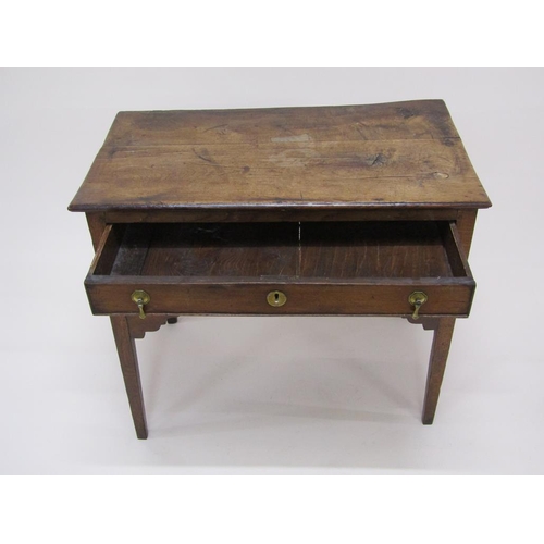 306 - A late Georgian oak and elm country lowboy of rectangular form with one long drawer over two short d... 