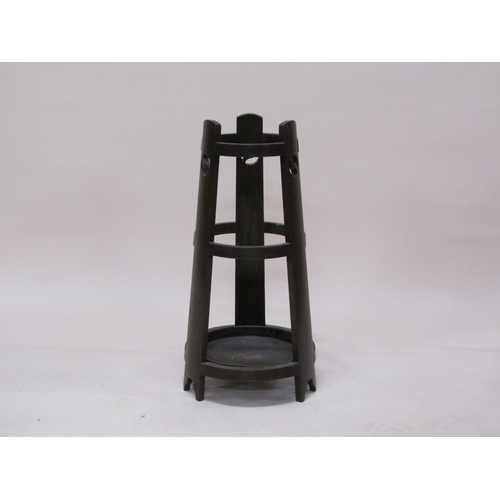 311 - An early 20c Liberty style oak stick stand, 74cm h.