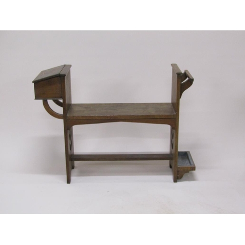 312 - An early 20c Liberty style oak hall seat with stick stand and side box with lift up cover, 101cm w, ... 