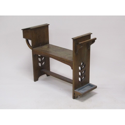 312 - An early 20c Liberty style oak hall seat with stick stand and side box with lift up cover, 101cm w, ... 