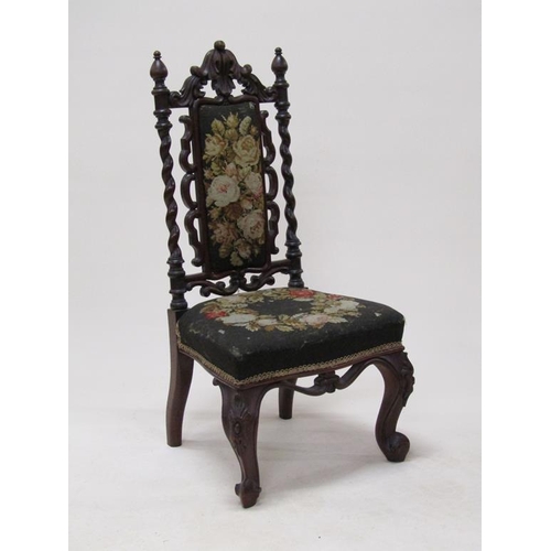 314 - A Victorian walnut upholstered prie dieu chair with a carved walnut frame, 92cm h.