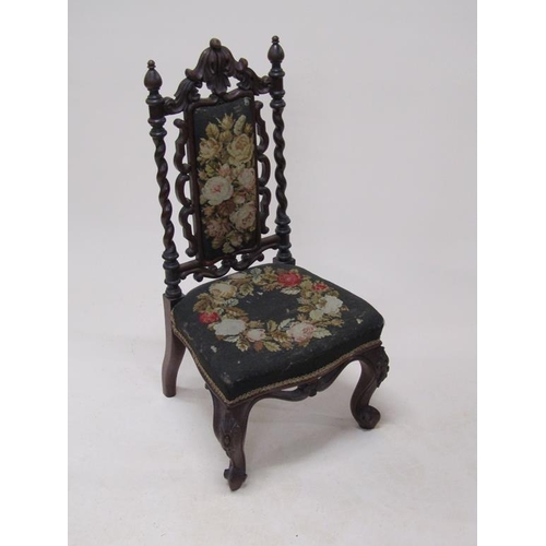 314 - A Victorian walnut upholstered prie dieu chair with a carved walnut frame, 92cm h.