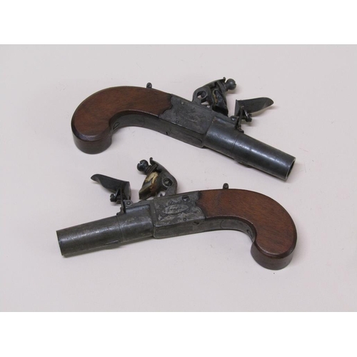 9 - A pair of 19c English pocket flinklock pistols, engraved with makers marks Jones, London, with walnu... 