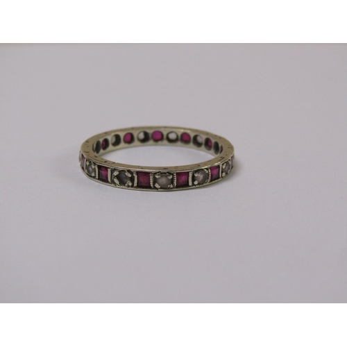 107 - A 9ct gold ruby and diamond eternity ring, size R.