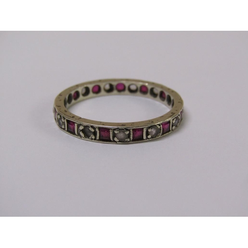 107 - A 9ct gold ruby and diamond eternity ring, size R.