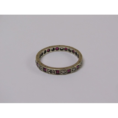 107 - A 9ct gold ruby and diamond eternity ring, size R.