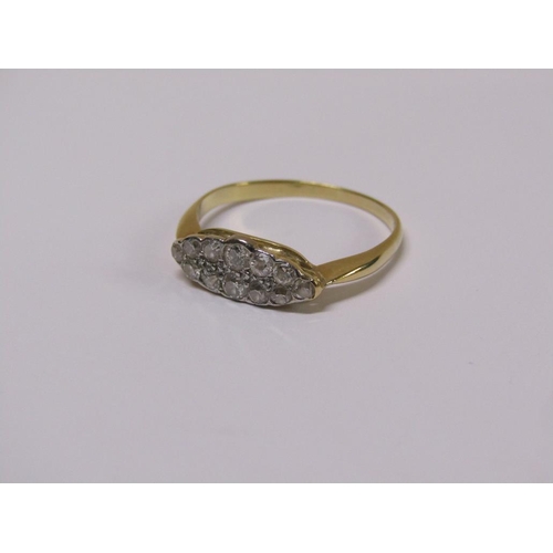 109 - A gold (unmarked) twelve stone diamond cluster ring, size Q.