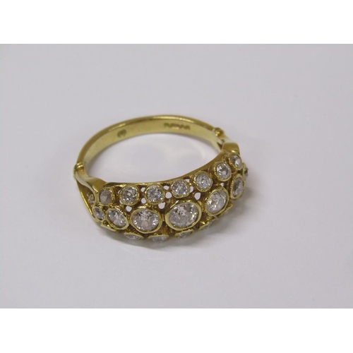 110 - An 18ct gold diamond cluster ring with five central graduated stones surrounded by sixteen smaller s... 