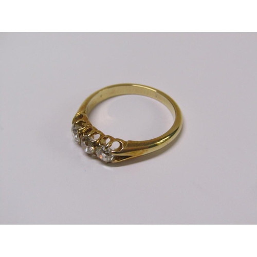 113 - A gold three stone set diamond ring, each stone approx. 1/4 ct, size N.