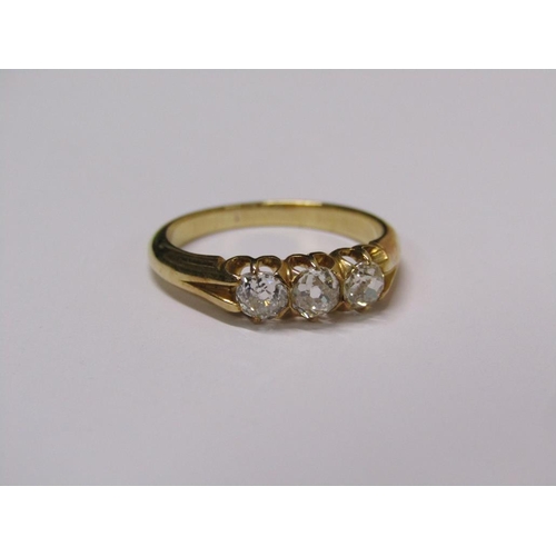 113 - A gold three stone set diamond ring, each stone approx. 1/4 ct, size N.