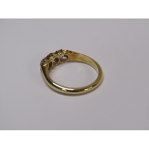 113 - A gold three stone set diamond ring, each stone approx. 1/4 ct, size N.