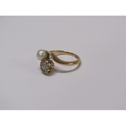 114 - An 18ct gold diamond daisy and pearl crossover ring, size L 1/2.