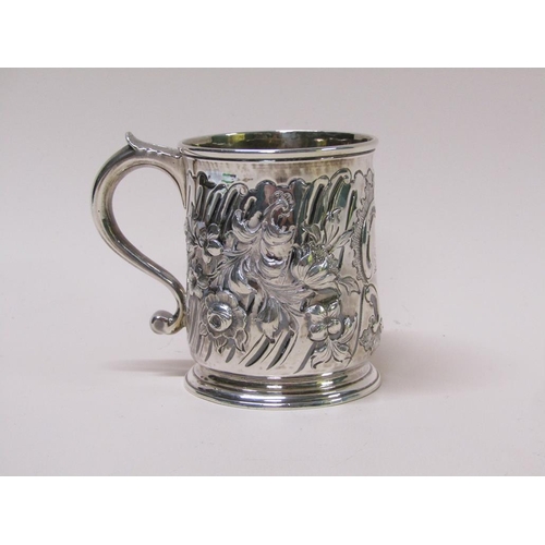 130 - An early Georgian silver tankard with later Victorian embossed decoration, makers mark for James Smi... 